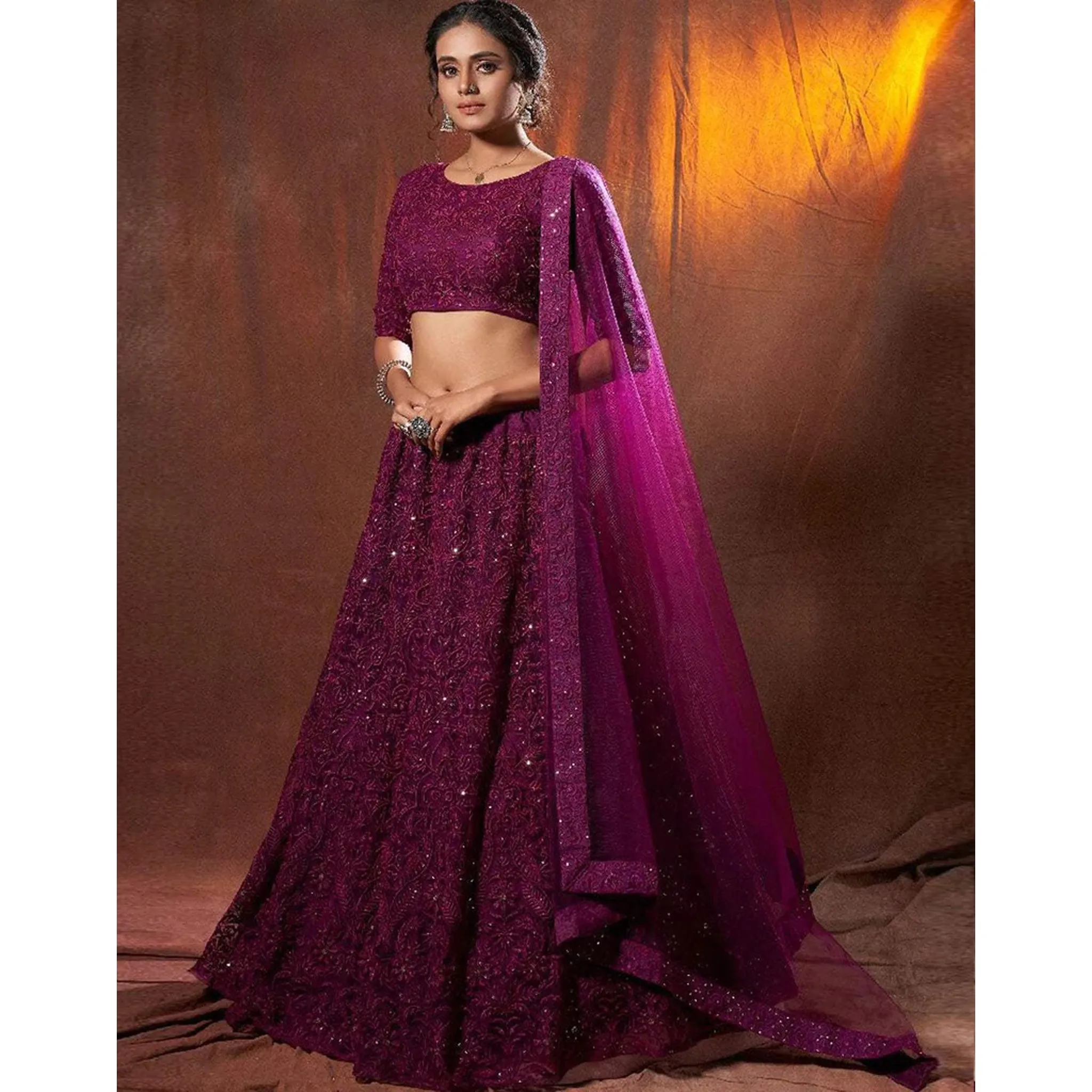 Designer Lehenga Choli in Net Fabrics and Wine Color with Embroidery Work