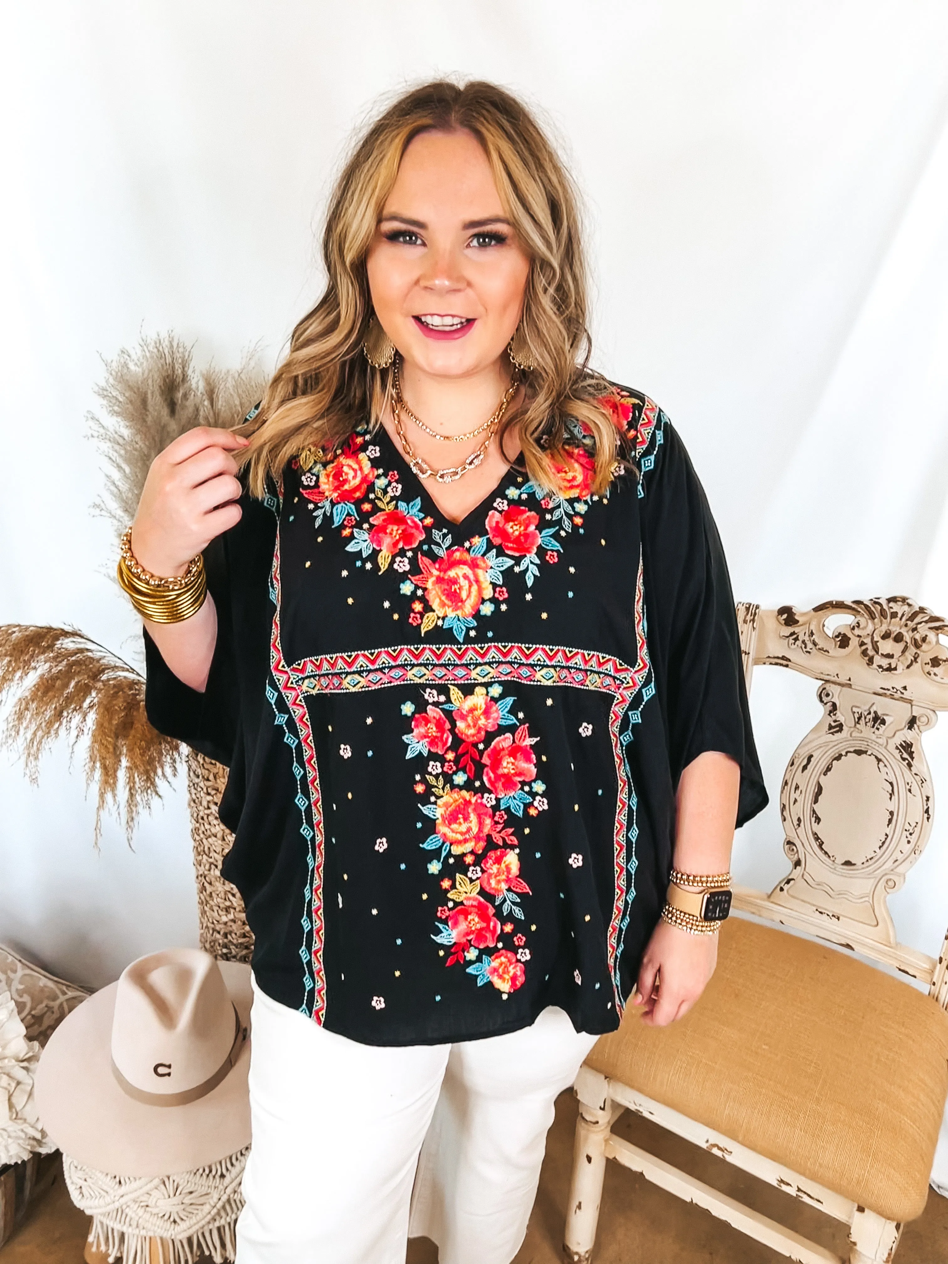 More To The Story Floral Embroidered Poncho Top in Black